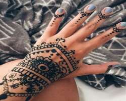One of her hidden talents is that she can also make the lovely henna designs.